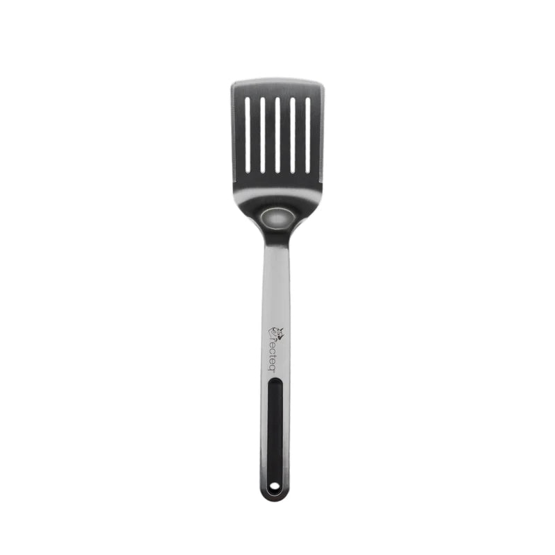 A professional kitchen utensil featuring a dark gray silicone slotted head and a stainless steel handle with a black grip, branded with the &