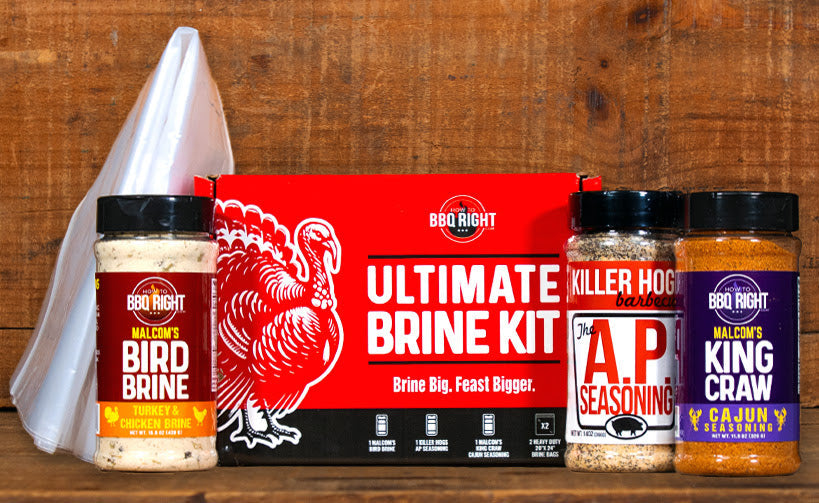 BBQ Right Ultimate Brine Kit with various seasoning bottles on a wooden background